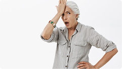 Woman expressing surprise or realization about common Medicare mistakes seniors make.