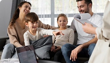 Family discussing life insurance options with an advisor, emphasizing family protection and financial security.