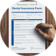 Dental insurance form being filled out, emphasizing the process of obtaining coverage for dental services.