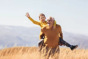 grandpa paying with grandson